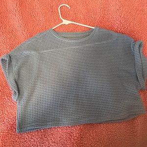 Woman’s blue crop top